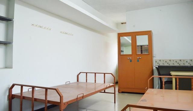 Furnished room ready for a new resident — TNG Senior Citizens Home, Coimbatore